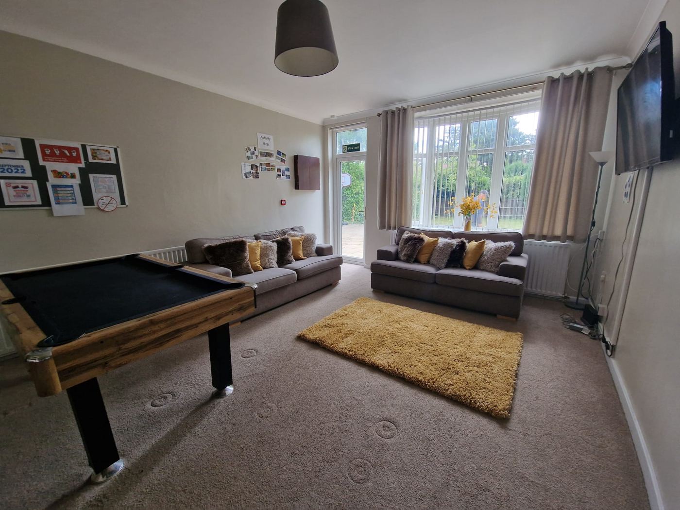 Games room with pool table and sofas