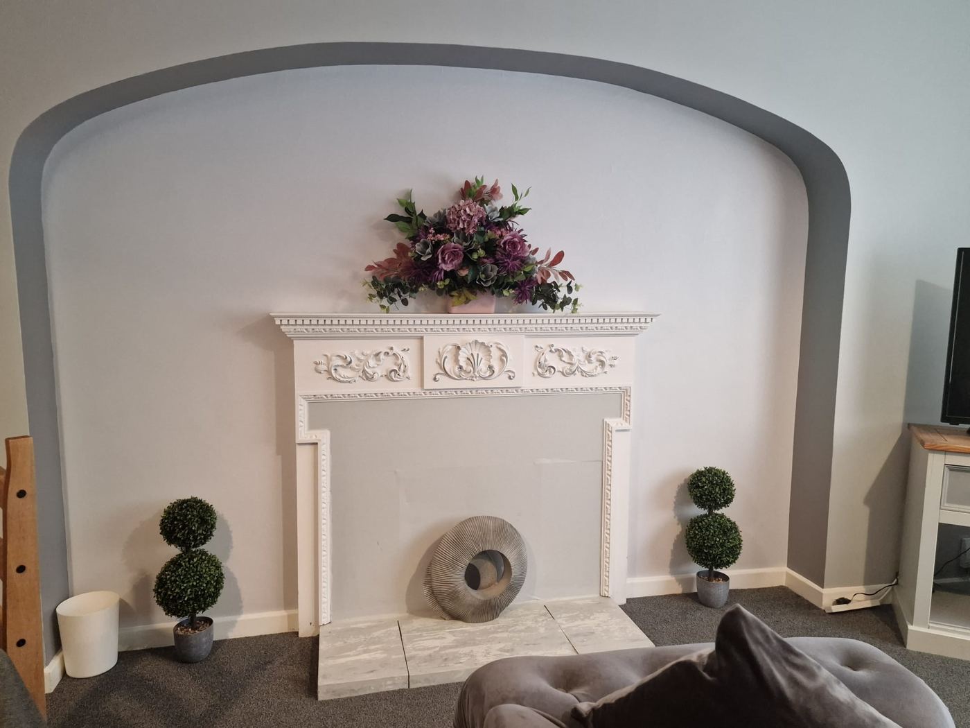 Decorative fireplace feature in the lounge